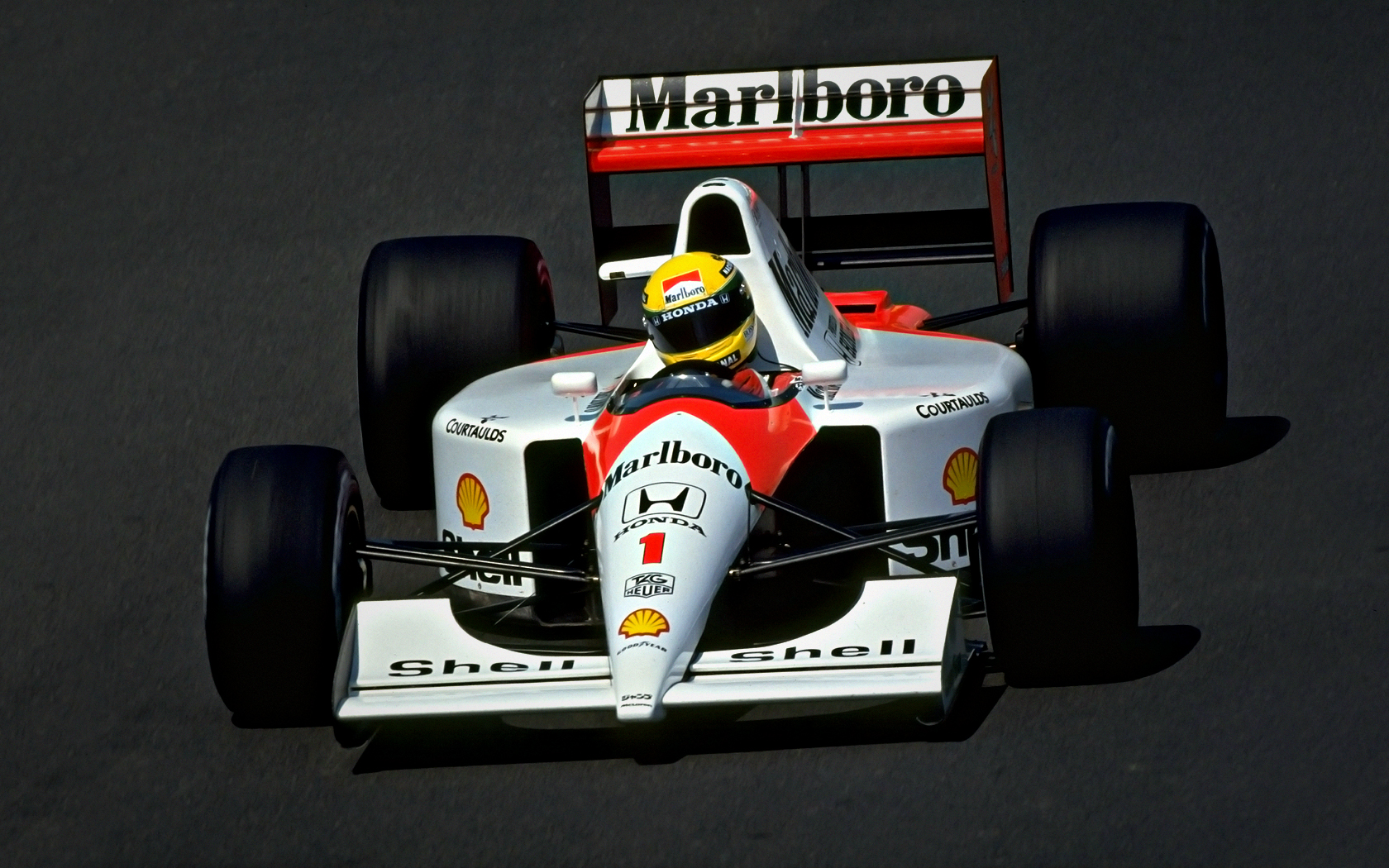 ayrton_senna_wallpaper_mclaren_by_johnnyslowhand-d2z46in.jpeg